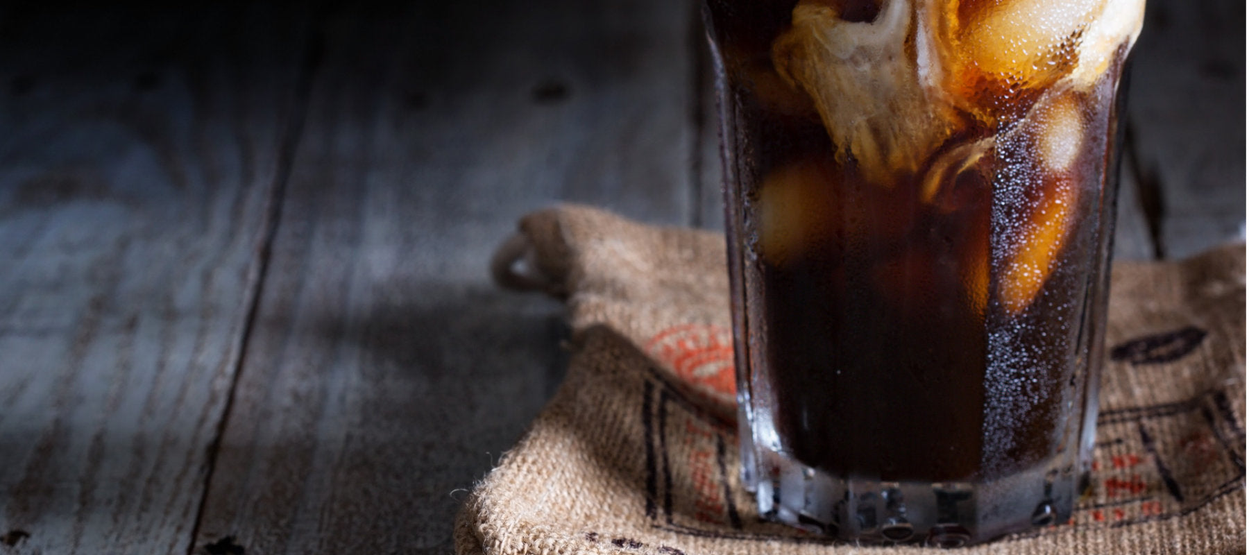 iced coffee in a glass. made with cold drip coffee and milk